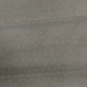 Tela color crema puntos blancos
